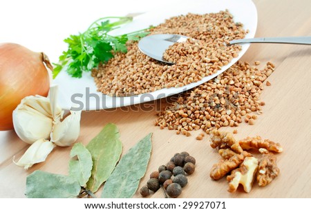 An ingredients for a boiled buckwheat separated on a table