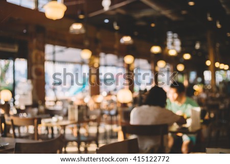 Blurred background of restaurant with people. - Stock Image - Everypixel