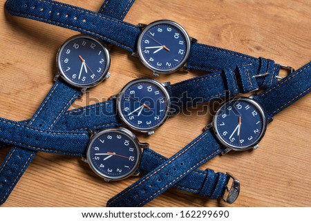 Set of watches with a blue dial and blue jeans strap