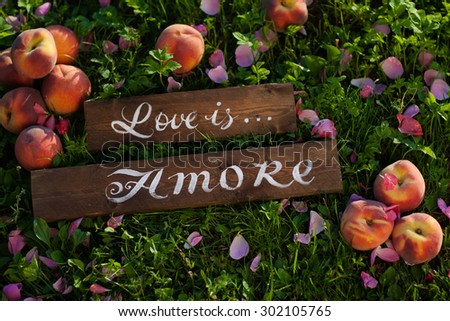 It is written on the label the word love  flowers roses
 wedding happiness romance