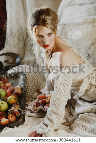 Blond woman Retro Style Image Black and white profile portrait of young beautiful woman with blond hai rand fruits and flowers