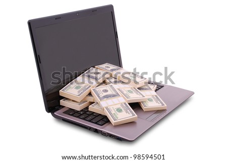 Laptop on white background. Dollars are on the keyboard. Clipping path included. Separate clipping path to the screen