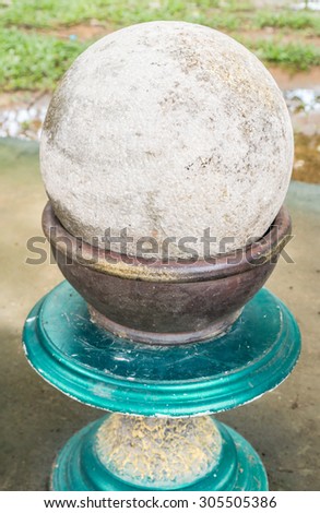 Round stone, the worship of Thailand. Some sacred marker spheres \