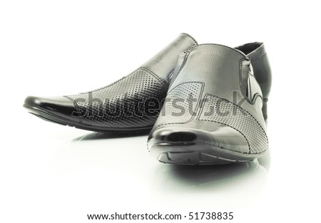 Black Men's patent-leather shoes isolated over white background