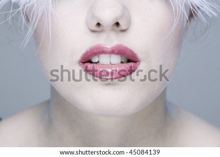 Young pretty woman?s face with long white eyelashes