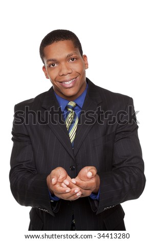 Isolated studio shot of a businessman holding out his hands, cupped as if he were holding something delicate.