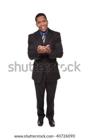 Isolated studio shot of a businessman holding out his hands, cupped as if he were holding something delicate.