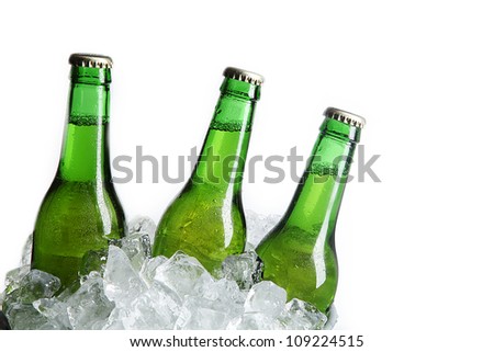 Three Green Beer Bottles In Ice Bucket With Condensation Isolated On ...