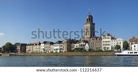 view on Deventer, Netherlands from the other side of the IJssel river. The church is the gothic Lebuinus Church, build between 1450 and 1525.