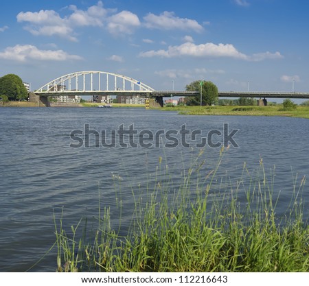 arch bridge over the IJssel river in the Netherlands