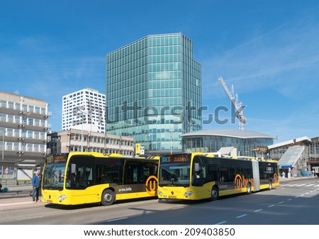 UTRECHT, NETHERLANDS - MAY 17, 2014: Exterior of the utrecht central station. It is the main hub of the railway lines in the Netherlands and is the area\'s largest railway station in the Netherlands