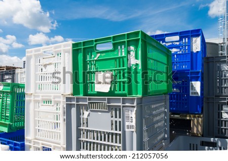 piled up empty plastic crates on an industrial area