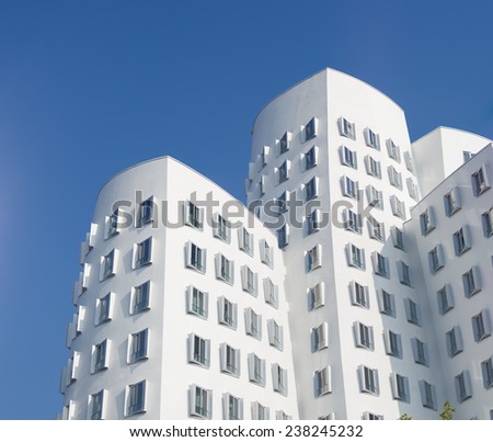 DUSSELDORF, GERMANY - SEPTEMBER 6, 2014: Modern distorted buildings of architect Frank O. Gehry located in the media harbor in dusseldorf