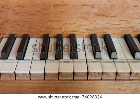 black and white keys of a small church organ