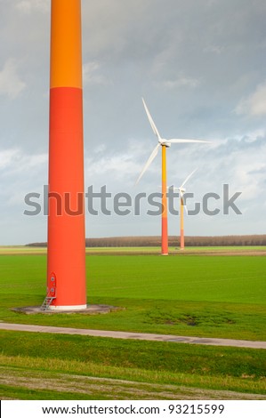 windmill farm with colorful windmills in Almere, netherlands
