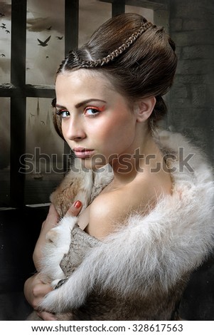Girl in wolf skin with hair in the Middle Ages