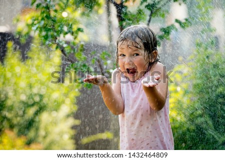 Similar – Image, Stock Photo Cute child under umbrella on rainy day in autumn park