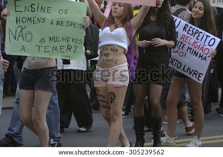 SAO PAULO, BRAZIL - May 26, 2012: Demonstration on the streets of Sao Paulo of women and feminists protesting against domestic violence in Brazil.