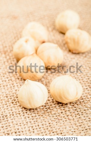 dried hazelnut on the linen background