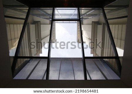 Similar – Image, Stock Photo Eclectic glazed facade of an urban building
