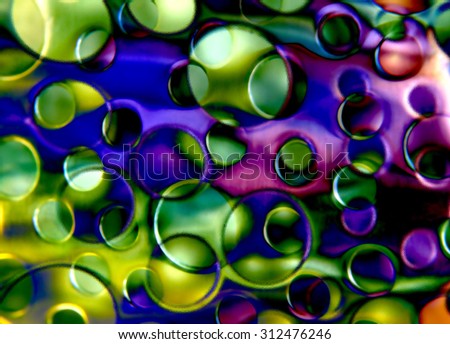 Digitally generated image of semitransparent perforated rippled glass panels. Abstract hi tech image. Distinctive colorful background for print or web page.