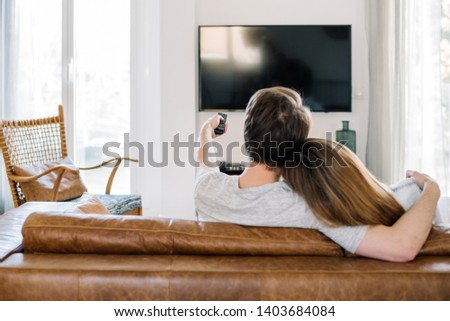 Similar – Image, Stock Photo Anonymous couple cuddling in apartment
