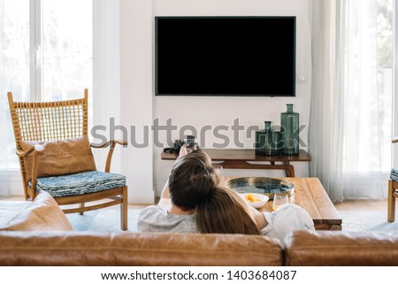 Similar – Image, Stock Photo Anonymous couple cuddling in apartment