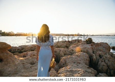 Image, Stock Photo Stylish tranquil woman against blue sky