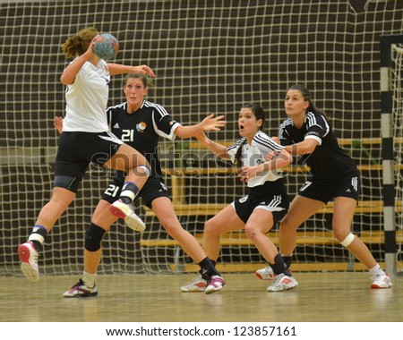 SIOFOK, HUNGARY - JANUARY 5: Unidentified players in action at a Hungarian National Championship handball match Siofok KC (black) vs. Budapest SE (white) January 5, 2013 in Siofok, Hungary.