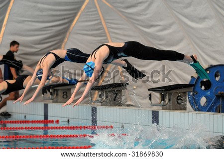 KAPOSVAR, HUNGARY - MAY 28: Two competitors starts in the international fin swimming competition , May 28, 2009 in Kaposvar, Hungary