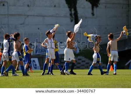 KAPOSVAR, HUNGARY - JULY 24: The winner bosnian players are glad at the V. Youth Football Festival Under 10 Final FC Novi Grad (BIH) vs MFK Kosice (SVK) - July 24, 2009 in Kaposvar, Hungary