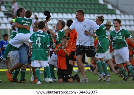 KAPOSVAR, HUNGARY - JULY 24: The winner Czech players celebrate at the V. Youth Football Festival Under 11 Final - MFK OKD Karvina (CZE) vs FC Novi Grad (BIH) - July 24, 2009 in Kaposvar.