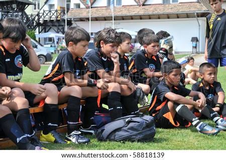 KAPOSVAR, HUNGARY - JULY 19: Venezuelan players listen to their trainer at a VI. Youth Football Festival match Efthymiades FA (CYP) vs. Academia Venezolana (VEN)- July 19, 2010 in Kaposvar, Hungary
