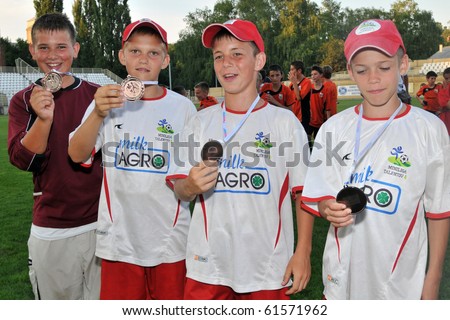 KAPOSVAR, HUNGARY - JULY 24: Unidentified players show their bronze medal after the VI. Youth Football Festival Under 12 Final FK Novi Grad (BOS) vs. FK Tuzla (BOS) July 24, 2010 in Kaposvar, Hungary