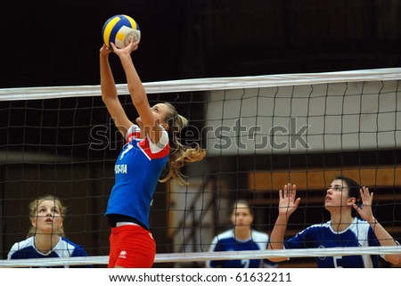 KAPOSVAR, HUNGARY - MARCH 3: Luca Borlai (7) posts the ball at the Hungarian Cup woman volleyball game Kaposvar vs. Vasas, March 3, 2007 in Kaposvar, Hungary.