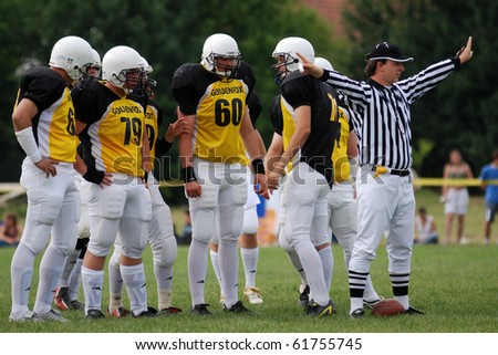 KAPOSVAR, HUNGARY - MAY 20: An unidentified referee in action an American football game Goldenfox vs. Budapest Cowboys, May 20, 2007 in Kaposvar, Hungary.