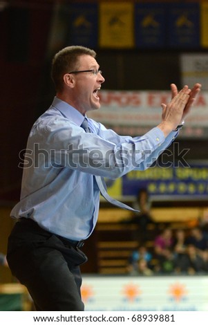KAPOSVAR, HUNGARY - JANUARY 12: Imre Horvath (Paks trainer) in action at a Hugarian Cup basketball game Kaposvar vs. Paks January 12, 2011 in Kaposvar, Hungary.
