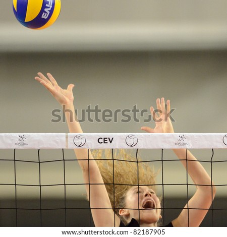 DEBRECEN, HUNGARY - JULY 9: Júlia Milovits (in black 18) in action a CEV European League woman\'s volleyball game Hungary (black) vs Israel (white) on July 9, 2011 in Debrecen, Hungary.