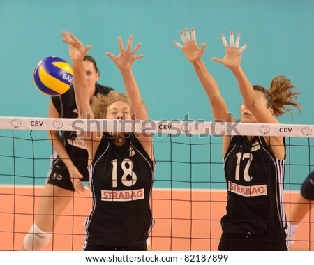 DEBRECEN, HUNGARY - JULY 9: Júlia Milovits (in black 18) in action a CEV European League woman's volleyball game Hungary (black) vs Israel (white) on July 9, 2011 in Debrecen, Hungary.