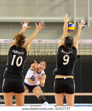 DEBRECEN, HUNGARY - JULY 9: Dora Horvath (in black 10) in action a CEV European League woman's volleyball game Hungary (black) vs Israel (white) on July 9, 2011 in Debrecen, Hungary.