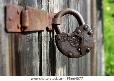 Hinged lock on the old shed