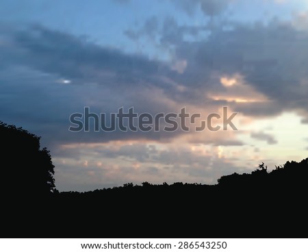 Vector illustration of a sunset landscape using a gradient mesh to give a photo-realistic appearance.