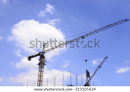 Is operation of the crane under the blue sky