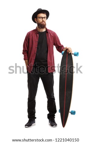 Similar – Image, Stock Photo Young bearded skater standing on ramp in skatepark