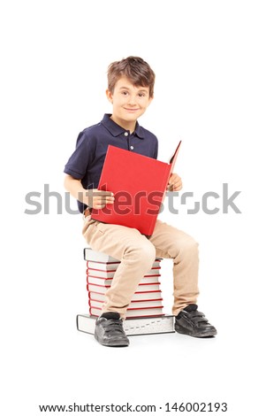 Similar – Image, Stock Photo Boy sitting on a sofa with headphones on his head and using the laptop