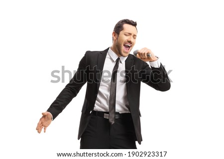 Similar – Image, Stock Photo Man holds a microphone in his hand ready to speak