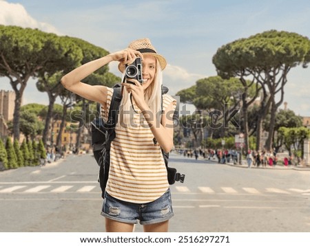 Similar – Image, Stock Photo Female tourist taking shot of sea in twilight
