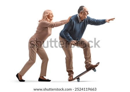 Similar – Image, Stock Photo Middle aged woman riding his electric scooter and looking at mobile phone.