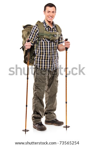 Full length portrait of a man in sportswear with backpack and hiking poles isolated on white background