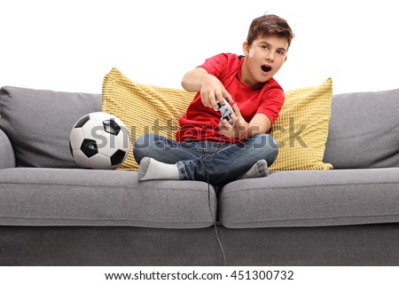 Similar – Image, Stock Photo Concentrated boy playing video game